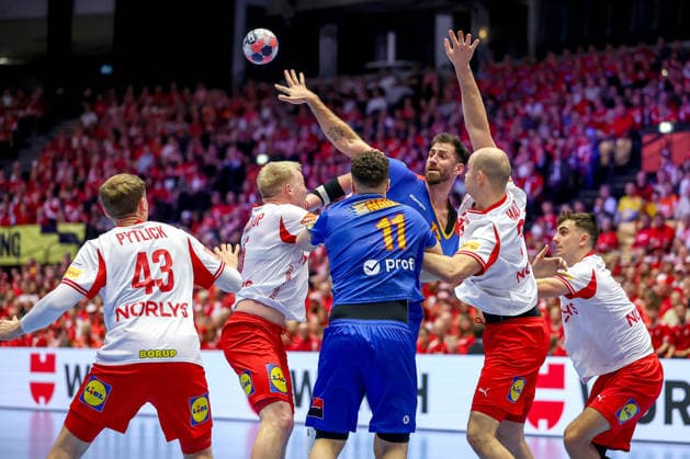 18 01 2026, Handball, Men s EHF EURO 2026, Denmark Romania, Jyske Bank Boxen in Herning, Denmark, Preliminary Round Dan Emil Racotea Romania 17 Robert Nagy Romania 11 in a duel against Simon Bogetoft Pytlick Denmark 43 Magnus Saugstrup Jensen Denmark 15 Simon Bogetoft Pytlick Denmark 43 Denmark