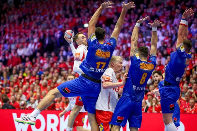 18 01 2026, Handball, Men s EHF EURO 2026, Denmark Romania, Jyske Bank Boxing in Herning, Denmark, Preliminary Round Mathias Gidsel Denmark 19 in a duel against Dan Emil Racotea Romania 17 Robert Mihai Militaru Romania 08 Radu Cristian Ghita Romania 13 Denmark
