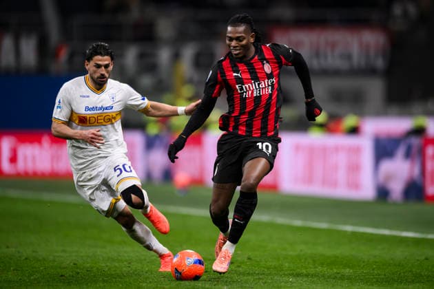 AC Milan v US Lecce - Serie A Rafael Leao of AC Milan competes for the ball with Santiago Pierotti of US Lecce during the Serie A football match between AC Milan and US Lecce. Milan Italy Copyright: xNicolòxCampox