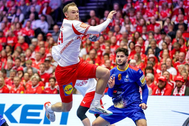 18 01 2026, Handball, Men s EHF EURO 2026, Denmark Romania, Jyske Bank Boxen in Herning, Denmark, Preliminary Round Mathias Gidsel Denmark 19 throws on goal by Ionut Ciprian Iancu Romania 01 Denmark