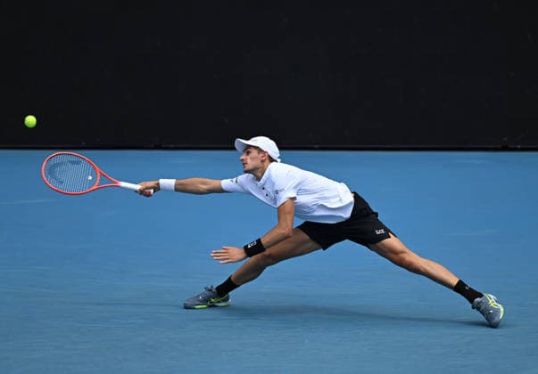 TENNIS AUSTRALIAN OPEN, Matteo Arnaldi of Italy in action during the Men™s 1st round match against Andrey Rublev of Russia on day 2 of the 2026 Australian Open tennis tournament at Melbourne Park in Melbourne, Monday, January 19, 2026. ( NO ARCHIVING MELBOURNE VICTORIA AUSTRALIA  Copyright: xJAMESxROSSx 20260119134513515534