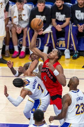 January 18, 2026, Los Angeles, California, USA: Toronto Raptors Scottie Barnes (4) goes to the basket against Los Angeles LakersÃ¢â‚¬â ¢ Gabe Vincent (7) during an NBA, Basketball Herren, USA basketball game at Crypto.com Arena on Sunday, Jan. 18, 2026 in Los Angeles. Los Angeles USA - ZUMAc68_ 20260118_zaf_c68_065 Copyright: xRingoxChiux