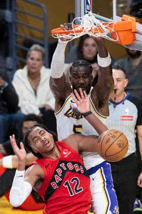 January 18, 2026, Los Angeles, California, USA: Los Angeles LakersÃ¢â‚¬â ¢ Deandre Ayton (5) dunks against Toronto Raptors Collin Murray-Boyles (12) during an NBA, Basketball Herren, USA basketball game at Crypto.com Arena on Sunday, Jan. 18, 2026 in Los Angeles. Los Angeles USA - ZUMAc68_ 20260118_zaf_c68_069 Copyright: xRingoxChiux