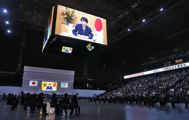 Athletes attend pep rally ahead of Olympics Japanese Prime Minister Sanae Takaichi (on screen) delivers a video message during a pep rally held for Japanese athletes in Funabashi near Tokyo on Jan. 18, 2026, ahead of the Milan-Cortina Winter Olympics.  A14AA0005189199P