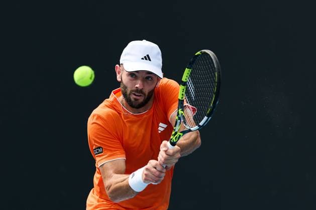 Jacob Fearnley of Great Britain hits a backhand Australian Open tennis tournament, Day Two, Melbourne Park, Australia - 19 Jan 2026Melbourne Melbourne Park Victoria (VIC) Australia  Copyright: xRachelxBach Shutterstockx 16303002az