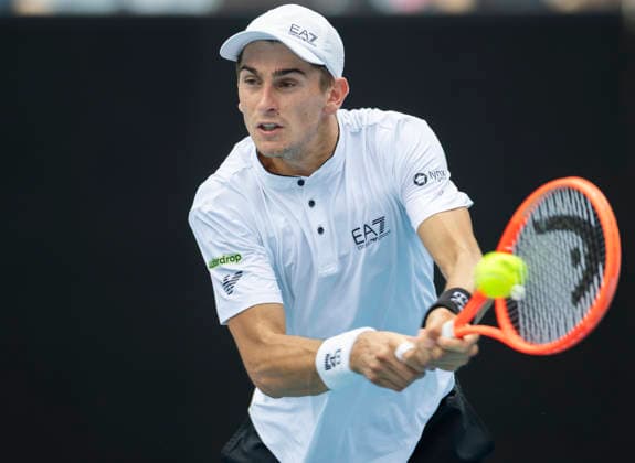 (260119) -- MELBOURNE, Jan. 19, 2026 -- Matteo Arnaldi of Italy hits a return during the men s singles 1st round match against Andrey Rublev of Russia at the Australian Open tennis tournament in Melbourne, Australia, Jan. 19, 2026. (Photo by Xinhua) (SP)AUSTRALIA-MELBOURNE-TENNIS-AUSTRALIAN OPEN-MEN S SINGLES-DAY 2 HuxJingchen 