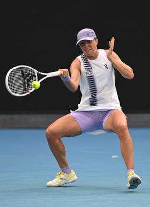 TENNIS AUSTRALIAN OPEN, Iga Swiatek of Poland in action during the Women™s 1st round match against Yue Yuan of China on day 2 of the 2026 Australian Open tennis tournament at Melbourne Park in Melbourne, Monday, January 19, 2026. ( NO ARCHIVING MELBOURNE VICTORIA AUSTRALIA  Copyright: xLUKASxCOCHx 20260119164136901854