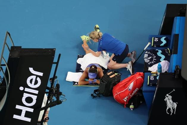 Yue Yuan during a medical timeout in her first round match Australian Open tennis tournament, Day Two, Melbourne Park, Australia - 19 Jan 2026Melbourne Melbourne Park Victoria (VIC) Australia  Copyright: xRachelxBach Shutterstockx 16303002dl