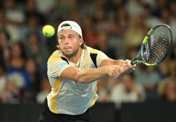 TENNIS AUSTRALIAN OPEN, Alexandre Muller of France in action during the Men™s 1st round match against Alexi Popyrin of Australia on day 2 of the 2026 Australian Open tennis tournament at Melbourne Park in Melbourne, Monday, January 19, 2026. ( NO ARCHIVING MELBOURNE VICTORIA AUSTRALIA  Copyright: xLUKASxCOCHx 20260119143339019460