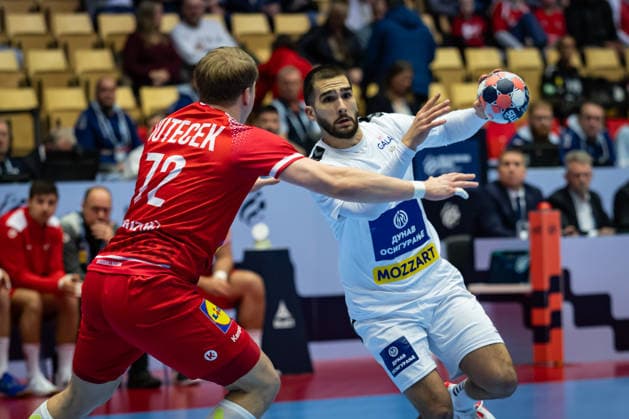 HERNING, DENMARK - JANUARY 19: Uros Kojadinovic (Serbia, 15) against Lukas Hutecek (Austria, 72) during the EHF EURO 2026 match between Austria vs Serbia at Jyske Bank Boxen Arena on matchday 3 of the Group Matches Group A on January 19, 2026 in Herning, Denmark. Midtjylland Denmark Copyright: xMarioxM.xKobergx