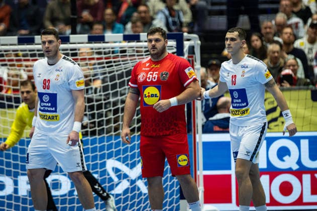 HERNING, DENMARK - JANUARY 19: Miljajo Marsenic(Serbia, 93), Tobias Wagner (Austria, 55), Uros Borzas (Serbia, 13) during the EHF EURO 2026 match between Austria vs Serbia at Jyske Bank Boxen Arena on matchday 3 of the Group Matches Group A on January 19, 2026 in Herning, Denmark. Midtjylland Denmark Copyright: xMarioxM.xKobergx