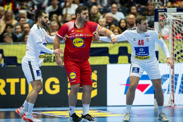 HERNING, DENMARK - JANUARY 19: Uros Kojadinovic (Serbia, 15), Tobias Wagner (Austria, 55), Dragan Pechmalbec (Serbia, 46) during the EHF EURO 2026 match between Austria vs Serbia at Jyske Bank Boxen Arena on matchday 3 of the Group Matches Group A on January 19, 2026 in Herning, Denmark. Midtjylland Denmark Copyright: xMarioxM.xKobergx