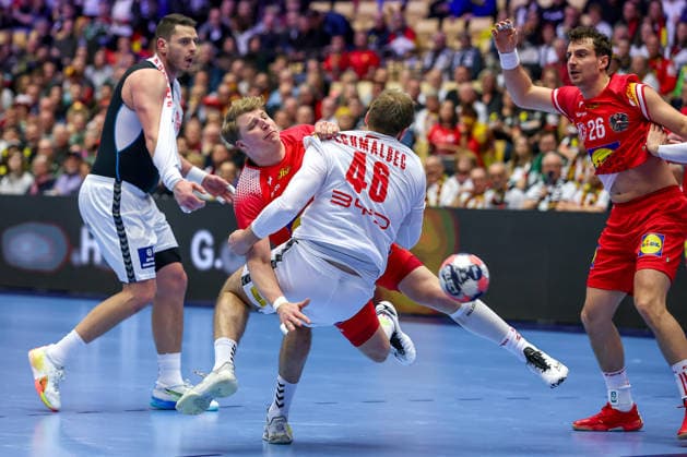 19 01 2026, Handball, Men s EHF EURO 2026, Austria Serbia, Jyske Bank Boxing in Herning, Denmark, Preliminary Round Lukas Hutecek Austria 72 in a duel against Dragan Pechmalbec Serbia 46 Denmark