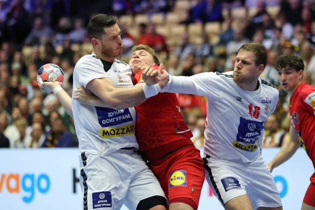 Austria Serbia, EHF Handball European Championship 2026 Lukas Hutecek Austria, 72 between Mijajlo Marsenic Serbia, 93 and Dragan Pechmalbec Serbia, 46 Handball EHF European Championship, international match between Austria and Serbia on January 19, 2026 in Herning Denmark , Herning Denmark Jyske Bank Boxing