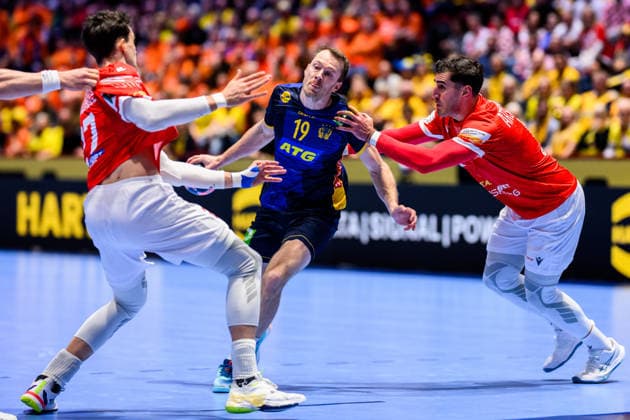 260119 Felix Claar of Sweden and Erekle Arsenashvili of Georgia during the EHF European Handball Championship preliminary round match between Georgia and Sweden on January 19, 2026 in Malmö Photo Petter Arvidson BILDBYRAN kod PA PA1125 handball handboll handball handbolls em 2026 georgien sverige sweden ehf european handball championship georgia bbeng  Copyright: PETTERxARVIDSON BB260119PA126