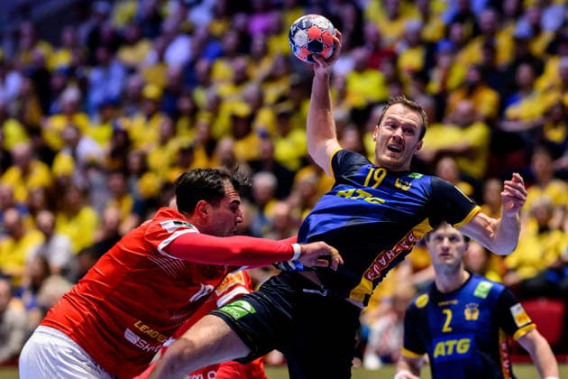 260119 Erekle Arsenashvili of Georgia and Felix Claar of Sweden during the EHF European Handball Championship preliminary round match between Georgia and Sweden on January 19, 2026 in Malmö Photo Petter Arvidson BILDBYRAN kod PA PA1125 handball handboll handball handbolls em 2026 georgien sverige sweden ehf european handball championship georgia bbeng  Copyright: PETTERxARVIDSON BB260119PA127