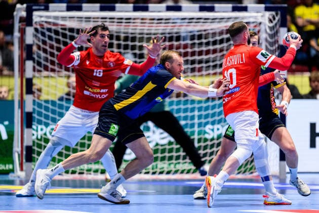 260119 Max Darj of Sweden and Irakli Kbilashvili of Georgia during the EHF European Handball Championship preliminary round match between Georgia and Sweden on January 19, 2026 in Malmö Photo Petter Arvidson BILDBYRAN kod PA PA1125 handball handboll handball handbolls em 2026 georgien sverige sweden ehf european handball championship georgia bbeng  Copyright: PETTERxARVIDSON BB260119PA145