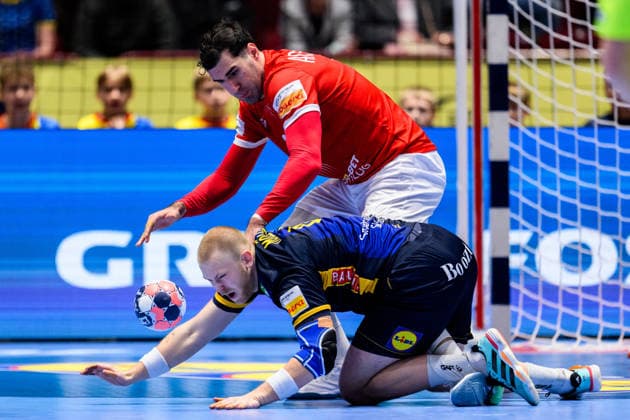 260119 Felix Möller of Sweden and Erekle Arsenashvili of Georgia during the EHF European Handball Championship preliminary round match between Georgia and Sweden on January 19, 2026 in Malmö Photo Petter Arvidson BILDBYRAN kod PA PA1125 handball handball handball handballs em 2026 georgien sverige sweden ehf european handball championship georgia bbeng  Copyright: PETTERxARVIDSON BB260119PA168