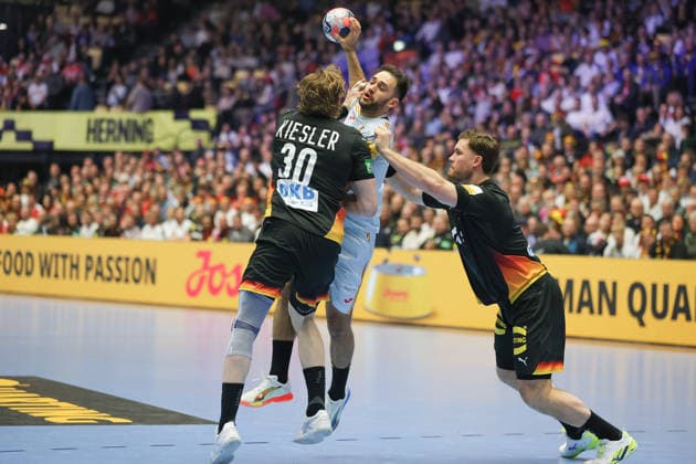 Germany Spain, EHF Handball European Championship 2026 Ian Tarrafeta Serrano Spain, 9 vs Tom Kiesler Germany, 30 and Johannes Golla Germany, 4 Handball EHF European Championship, international match between Germany and Spain on January 19, 2026 in Herning Denmark , Herning Denmark Jyske Bank Boxen