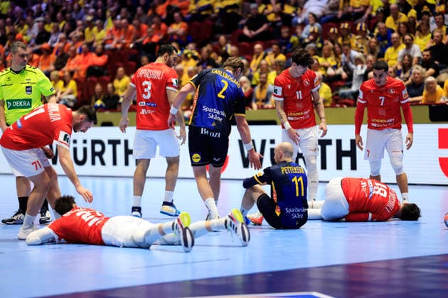MALMÖ, SWEDEN 20260119 Georgias Nikoloz Kalandadze and Georgias Erekle Arsenashvili are in pain during the European Handball Championship Group E match between Georgia and Sweden in Malmö Arena, Malmö, Sweden, January 19, 2026 MALMÖ SWEDEN x10600x  Copyright: xAndreasxHillergren TTx HANDBOLLS-EM 2026 GEORGIEN - SVERIGE