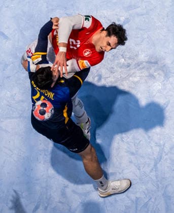 260119 Nikola Roganovic of Sweden and Nikoloz Kalandadze of Georgia during the EHF European Handball Championship preliminary round match between Georgia and Sweden on January 19, 2026 in Malmö Photo Petter Arvidson BILDBYRAN kod PA PA1125 handball handball handball handballs em 2026 georgien sverige sweden ehf european handball championship georgia bbeng  Copyright: PETTERxARVIDSON BB260119PA296