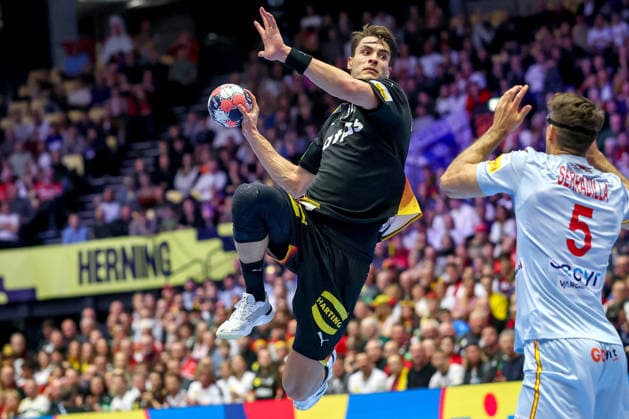 19 01 2026, Handball, Men s EHF EURO 2026, Germany Spain, Jyske Bank Boxen in Herning, Denmark, Preliminary Round Julian Köster Germany 18 throws against Antonio Serradilla Cuenca Espania 05 on goal Denmark