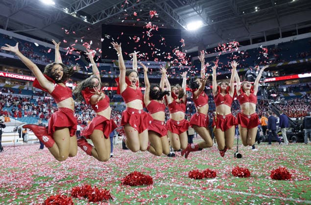 The Indiana cheerleaders celebrate on the field after the Hoosiers defeated the Miami Hurricanes 27-21 in the NCAA, College League, USA College Football Championship game at Hard Rock Stadium in Miami, Florida, on Monday, January 19, 2026.  MIA20260119893 AARONxJOSEFCZYK