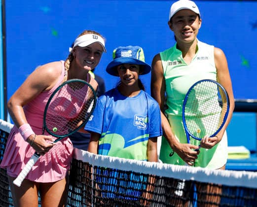 (260120) -- MELBOURNE, Jan. 20, 2026 -- Zhang Shuai (R) of China and Taylah Preston (L) of Australia pose with a ball kid before their women s singles 1st round match at the Australian Open tennis tournament in Melbourne, Australia, Jan. 20, 2026. ) (SP)AUSTRALIA-MELBOURNE-TENNIS-AUSTRALIAN OPEN-WOMEN S SINGLES-DAY 3 MaxPing 