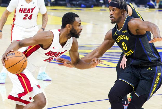 (260120) -- SAN FRANCISCO, Jan. 20, 2026 -- Golden State Warriors Jimmy Butler III (R) defends Miami Heat s Andrew Wiggins during the 2025-2026 NBA, Basketball Herren, USA regular season basketball game between Golden State Warriors and Miami Heat in San Francisco, the United States, Jan. 19, 2026. (Photo by Xinhua) (SP)U.S.-SAN FRANCISCO-BASKETBALL-NBA-WARRIORS VS HEAT ArthurxDong 