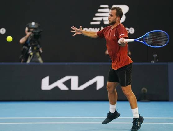 (260120) -- MELBOURNE, Jan. 20, 2026 -- Hugo Gaston hits a return during the men s singles 1st round match between Hugo Gaston of France and Jannik Sinner of Italy at the Australian Open tennis tournament in Melbourne, Australia, Jan. 20, 2026. (Photo by Xinhua) (SP)AUSTRALIA-MELBOURNE-TENNIS-AUSTRALIAN OPEN-MEN S SINGLES-DAY 3 WangxShen 