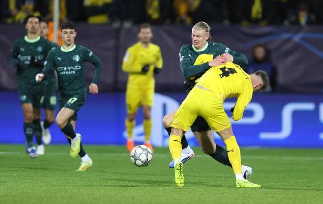Odin Bjortuft of Bodo Glimt and Erling Haaland of Manchester City in action Bodo Glimt v Manchester City, UEFA Champions League, Group Stage, Football, Aspmyra Stadion, Bodo, Norway - 20 Jan 2026Bodo Aspmyra Stadion Norway EDITORIAL USE ONLY No use with unauthorised audio, video, data, fixture lists, club league logos or live services. Online in-match use limited to 120 images, no video emulation. No use in betting, games or single club league player publications. Copyright: xKieranxMcManus Shutterstockx 16348328aa