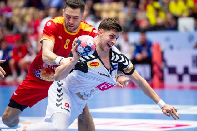 EHF Handball European Championship North Macedonia Romania North Macedonia s Igor Gjorgiev in action with Romania s Robert Militaru during the men s handball match between North Macedonia and Romania in EHF Euro 2026 group B at Jyske Bank Boxen in Herning on Tuesday, January 20, 2026 Photo Bo Amstrup Ritzau Scanpix , Herning Denmark Mors  Copyright: BoxAmrstrupx xRitzauxScanpix BoxAmstrupx spdk20260120-200250-L