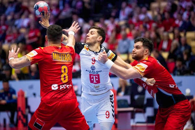EHF Handball European Championship North Macedonia Romania North Macedonia s Igor Gjorgiev in action with Romania s Robert Militaru and Robert Nagy during the men s handball match between North Macedonia and Romania in EHF Euro 2026 group B at Jyske Bank Boxen in Herning on Tuesday, January 20, 2026 Photo Bo Amstrup Ritzau Scanpix , Herning Denmark Mors  Copyright: BoxAmrstrupx xRitzauxScanpix BoxAmstrupx spdk20260120-200706-L