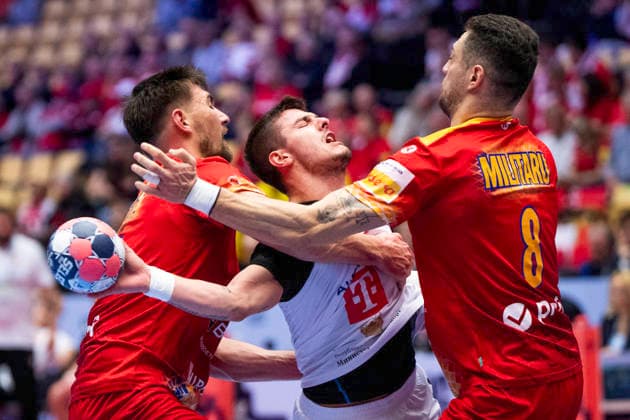 EHF Handball European Championship North Macedonia Romania North Macedonia s Marko Mitev in action with Romania s Andrei Buzle and Robert Militaru during the men s handball match between North Macedonia and Romania in EHF Euro 2026 group B at Jyske Bank Boxen in Herning on Tuesday, January 20, 2026 Photo Bo Amstrup Ritzau Scanpix , Herning Denmark Mors  Copyright: BoxAmrstrupx xRitzauxScanpix BoxAmstrupx spdk20260120-200816-L