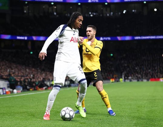 London, England, 20th January 2026. Djed Spence of Tottenham and Yan Couto of Borussia Dortmund during the Tottenham Hotspur vs Borussia Dortmund UEFA Champions League match at the Tottenham Hotspur Stadium, London. Picture credit should read: David Klein Sportimage EDITORIAL USE ONLY. No use with unauthorised audio, video, data, fixture lists, club league logos or live services. Online in-match use limited to 120 images, no video emulation. No use in betting, games or single club league player publications. SPI_033_DK_Spurs_Dortmund SPI-4464-0033