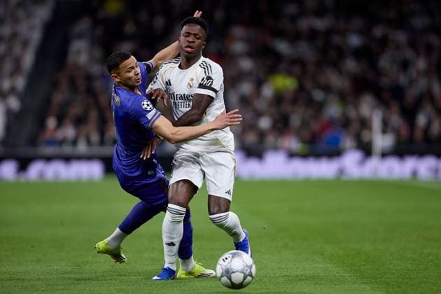 Vinicius Jr of Real Madrid CF and Vandersonof AS Monaco FC Real Madrid v AS Monaco, UEFA Champions League, Group Stage, Football, Estadio Bernabeu, Madrid, Spain - 20 Jan 2026Madrid Estadio Bernabeu Spain EDITORIAL USE ONLY No use with unauthorised audio, video, data, fixture lists, club league logos or live services. Online in-match use limited to 120 images, no video emulation. No use in betting, games or single club league player publications. Copyright: xRubenxAlbarran Shutterstockx 16374322j