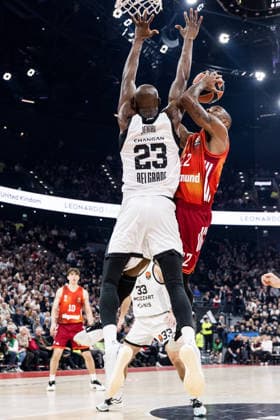 MUNICH, GERMANY - JANUARY 20: Isiaha Mike (FC Bayern Muenchen, 22) tries to score against Tonye Jekiri (Partizan Mozzart Bet Belgrade, 23) during the Turkish Airlines EuroLeague match between FC Bayern Muenchen vs. Partizan Mozzart Bet Belgrade at SAP Garden on round 23 of Turkish Airlines EuroLeague on January 20, 2026 in Munich, Germany. Bavaria Germany Copyright: xSteffiexWunderlx