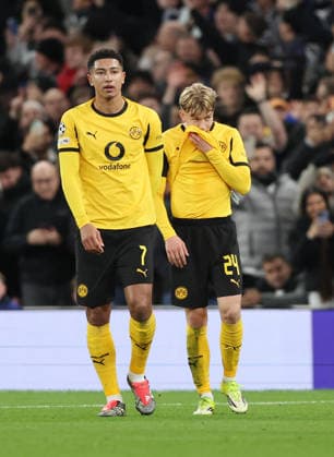 London, England, 20th January 2026. Daniel Svensson of Borussia Dortmund (l) looks on as he receives a red card during the Tottenham Hotspur vs Borussia Dortmund UEFA Champions League match at the Tottenham Hotspur Stadium, London. Picture credit should read: David Klein Sportimage EDITORIAL USE ONLY. No use with unauthorised audio, video, data, fixture lists, club league logos or live services. Online in-match use limited to 120 images, no video emulation. No use in betting, games or single club league player publications. SPI_055_DK_Spurs_Dortmund SPI-4464-0056