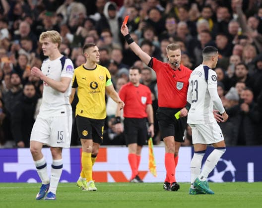 London, England, 20th January 2026. Referee Glenn Nyberg issues a red card to Daniel Svensson of Borussia Dortmund (not in picture) during the Tottenham Hotspur vs Borussia Dortmund UEFA Champions League match at the Tottenham Hotspur Stadium, London. Picture credit should read: David Klein Sportimage EDITORIAL USE ONLY. No use with unauthorised audio, video, data, fixture lists, club league logos or live services. Online in-match use limited to 120 images, no video emulation. No use in betting, games or single club league player publications. SPI_056_DK_Spurs_Dortmund SPI-4464-0057