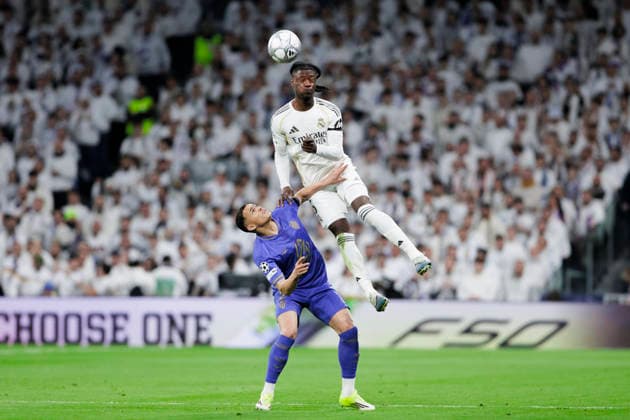 UEFA champions league - Real Madrid vs AS Monaco MADRID, SPAIN - January 20:Eduardo Camavinga of Real Madrid and Folarin Balogun of AS Monaco fight for the ball during the UEFA champions league 2025 26 match between Real Madrid and AS Monaco at Santiago Bernabeu Stadium. (Photo by Guille Martinez f22photo) Madrid Santiago Bernabeu Stadium Spain Copyright: xGuillermoxMartinezx