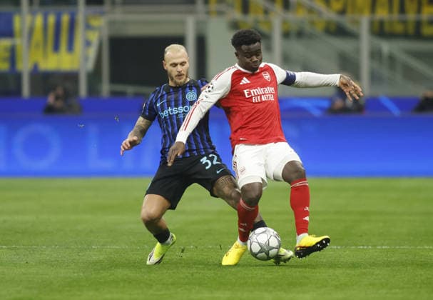 Bukayo Saka of FC Arsenal and Federico Di Marco of FC Inter during the Uefa Champions League 2025 26 season football match between FC Inter and FC Arsenal on 20 January 2026 at â?? Giuseppe Meazza Stadium, San Siro, Milan, Italy. Photo Nderim KACELI  Copyright: xNderimxKaceli IPAxSportx xipa-agency.netx xx IPA_70342175 IPA_Agency_IPA70342175