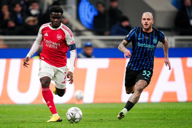 Arsenal s Bukayo Saka, Inter Milan™s Federico Dimarco during the Uefa Champions League soccer match between Inter and Arsenal at the San Siro Stadium in Milan , north Italy - Tuesday , January 20, 2026. - Soccer .  Copyright: xMarcoxAlpozzi LaPressex