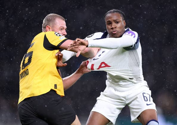 London, England, 20th January 2026. Julian Ryerson of Borussia Dortmund (l) tussles with Jun™ai Byfield of Tottenham during the Tottenham Hotspur vs Borussia Dortmund UEFA Champions League match at the Tottenham Hotspur Stadium, London. Picture credit should read: David Klein Sportimage EDITORIAL USE ONLY. No use with unauthorised audio, video, data, fixture lists, club league logos or live services. Online in-match use limited to 120 images, no video emulation. No use in betting, games or single club league player publications. SPI_091_DK_Spurs_Dortmund SPI-4464-0091