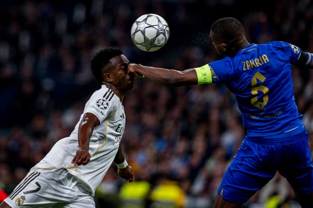Real Madrid C.F. v AS Monaco - UEFA Champions League 2025 26 League Phase MD7 Vinicius Junior of Real Madrid (L) receives a punch from Denis Zakaria of AS Monaco (R) during the UEFA Champions League 2025 26 League Phase MD7 match between Real Madrid C.F. and AS Monaco at Estadio Santiago Bernabeu on January 20, 2026 in Madrid, Spain. Madrid Estadio Santiago Bernabeu Madrid Spain Copyright: xAlbertoxGardinx AGardin_20260120_Foot_Champ_ReaMad_Mon_1389