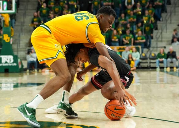 January 20, 2026, Waco, Texas, USA: Baylor center JAMES NNAJI (46) battles Texas Tech guard CHRISTIAN ANDERSON (4) for a loose ball during a college basketball game between the Baylor Bears and the Texas Tech Red Raiders on January 20, 2026 in Waco, Texas. Texas Tech won, 92-73. Waco USA - ZUMAc201 20260120_zap_c201_051 Copyright: xScottxColemanx