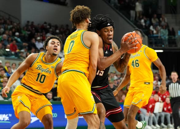 January 20, 2026, Waco, Texas, USA: Texas Tech forward JT TOPPIN (15) moves the ball against Baylor guard DAN SKILLINGS JR. (0) during a college basketball game between the Baylor Bears and the Texas Tech Red Raiders on January 20, 2026 in Waco, Texas. Texas Tech won, 92-73. Waco USA - ZUMAc201 20260120_zap_c201_057 Copyright: xScottxColemanx
