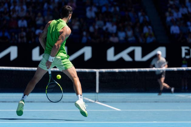 January 21, 2026: 1st seed CARLOS ALCARAZ of Spain in action against YANNICK HANFMANN of Germany on Rod Laver Arena in a Men s Singles 2nd round match on day 4 of the 2026 Australian Open in Melbourne, Australia. ALCARAZ won 76 63 62. Cal Media Melbourne Australia - ZUMAc04_ 20260121_faf_c04_011 Copyright: xSydneyxLowx