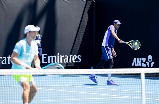 (260121) -- MELBOURNE, Jan. 21, 2026 -- Rajeev Ram (R) of the United States Matthew Ebden of Australia compete during the men s doubles 1st round match against Zhang Zhizhen Shang Juncheng of China at the Australian Open tennis tournament in Melbourne, Australia, Jan. 21, 2026. (Photo by Xinhua) (SP)AUSTRALIA-MELBOURNE-TENNIS-AUSTRALIAN OPEN-MEN S DOUBLES-DAY 4 HuxJingchen 