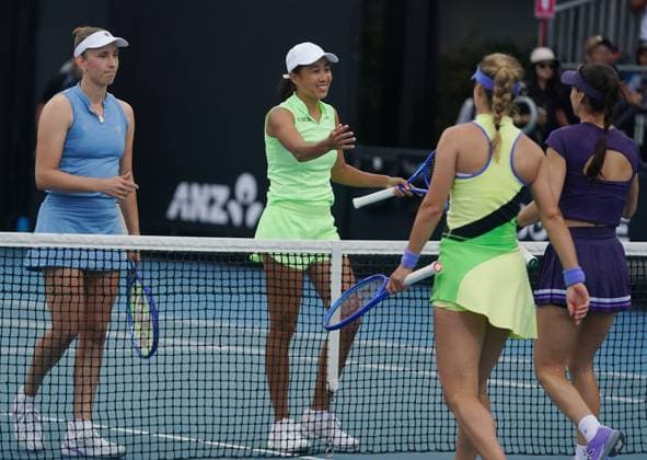(260121) -- MELBOURNE, Jan. 21, 2026 -- Zhang Shuai (2nd L) Elise Mertens (1st L) greets with their opponents after the women s doubles 1st round match between Zhang Shuai (China) Elise Mertens (Belgium) and Sorana Cirstea (Romania) Anna Kalinskaya (Russia) at the Australian Open tennis tournament in Melbourne, Australia, Jan. 21, 2026. (Photo by Xinhua) (SP)AUSTRALIA-MELBOURNE-TENNIS-AUSTRALIAN OPEN-WOMEN S DOUBLES-DAY 4 WangxShen 