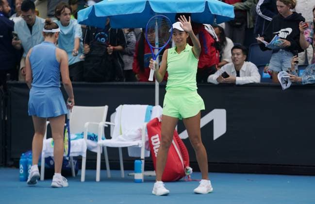 (260121) -- MELBOURNE, Jan. 21, 2026 -- Zhang Shuai (R) waves to the spectators after the women s doubles 1st round match between Zhang Shuai (China) Elise Mertens (Belgium) and Sorana Cirstea (Romania) Anna Kalinskaya (Russia) at the Australian Open tennis tournament in Melbourne, Australia, Jan. 21, 2026. (Photo by Xinhua) (SP)AUSTRALIA-MELBOURNE-TENNIS-AUSTRALIAN OPEN-WOMEN S DOUBLES-DAY 4 WangxShen 